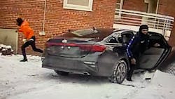 Two suspects are seen fleeing following a shooting that left a Cleveland police detective wounded Tuesday. Two suspects are seen fleeing following a shooting that left a Cleveland police detective wounded Tuesday.