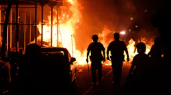 NYPD officers and FDNY firefighters respond after protesters set a large fire in Manhattan, New York City during a protest against police brutality and the death of George Floyd in 2020.
