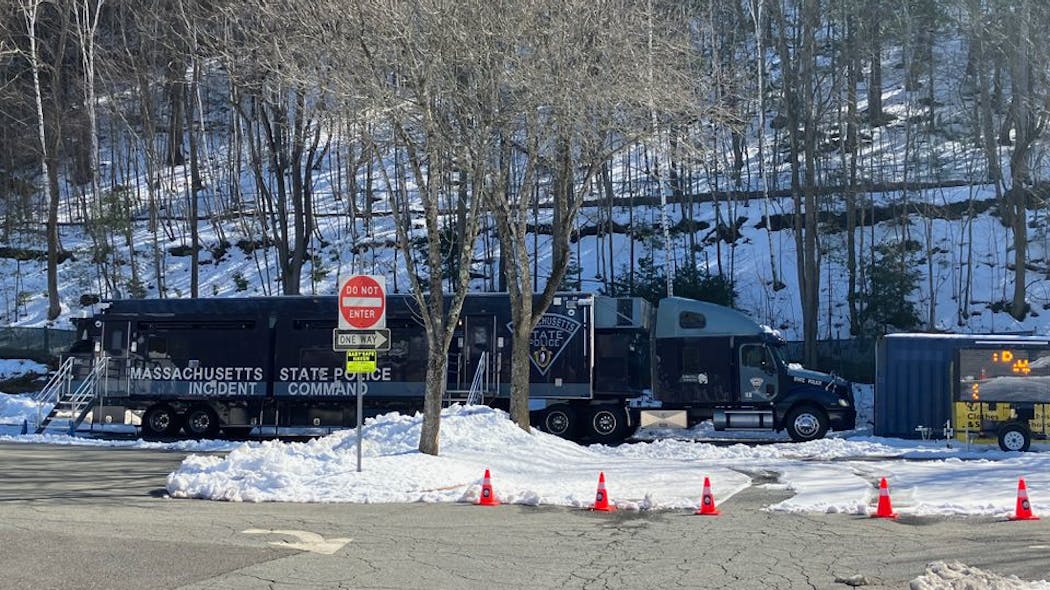 The Massachusetts State Police has set up a mobile command center in front of the Greenfield Police Department after the agency eliminated overnight patrol shifts because of staffing levels.