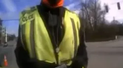 Norcross, GA, police arrested a man who was impersonating a police officer and directing traffic at a busy intersection Tuesday.