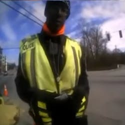 Norcross, GA, police arrested a man who was impersonating a police officer and directing traffic at a busy intersection Tuesday. Norcross, GA, police arrested a man who was impersonating a police officer and directing traffic at a busy intersection Tuesday.