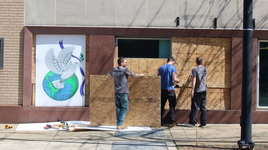 Businesses in downtown Akron, OH, began boarding up windows as the city waits for a grand jury decision on whether the eight officers who fatally shot Jayland Walker will face charges. Businesses in downtown Akron, OH, began boarding up windows as the city waits for a grand jury decision on whether the eight officers who fatally shot Jayland Walker will face charges.