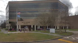 Baton Rouge police headquarters was evacuated Friday after someone brought explosive training equipment there seeking to dispose of it, the agency said in a news release.