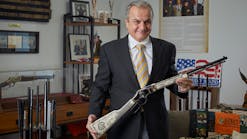 Henry Repeating Arms Founder and CEO Anthony Imperato displays a Henry American Eagle lever action rifle in the company&rsquo;s Bayonne, New Jersey manufacturing plant.