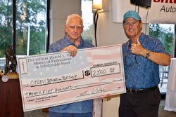Bobby Vitale, left, presents Craig Floyd with a $2,500 donation to Citizens Behind the Badge. Bobby Vitale, left, presents Craig Floyd with a $2,500 donation to Citizens Behind the Badge.