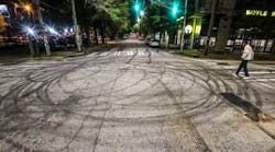 Patches of tire marks swirled across the intersection of Wesley Dobbs and Piedmont avenues near Georgia State University in Atlanta.
