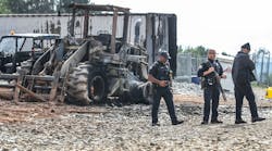 Atlanta police and construction personnel were on the site of the city&apos;s planned public safety training center in March, examining equipment set on fire and destroyed by violent protests.