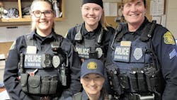 Frederick Police Cpl. Stephanie Sparks (r), who is assistant supervisor of her squad, with three officers from her shift.