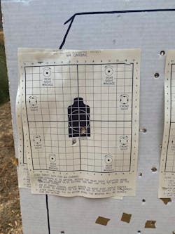 This is Lindsey&apos;s first group, 4 shots at 10 yards, after mounting the RFX45. It took only 5 rounds to sight it.