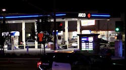 A gas station and church were blocked off early Thursday while Fresno, CA, police investigated the scene where an officer shot a man.