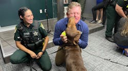 Osceola County, FL, Sheriff&apos;s Office newest bloodhound, Luke, licks Scent Evidence K9 CEO Paul Coley. As part of a new partnership with the Osceola Sheriff&apos;s Office, the Senior Resource Alliance and Scent Evidence K9 in an effort to find missing people in the county faster, Coley announced on Wednesday.