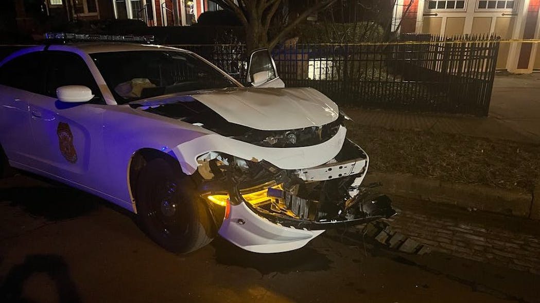 An Indianapolis police cruiser suffered extensive damage when a suspect in a stolen truck rammed the vehicle multiple times during a traffic stop Friday.