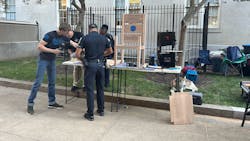 The staff of Saving a Hero's Place works on an Honor Chair outside the National Law Enforcement Museum in Washington, D.C. The staff of Saving a Hero's Place works on an Honor Chair outside the National Law Enforcement Museum in Washington, D.C.