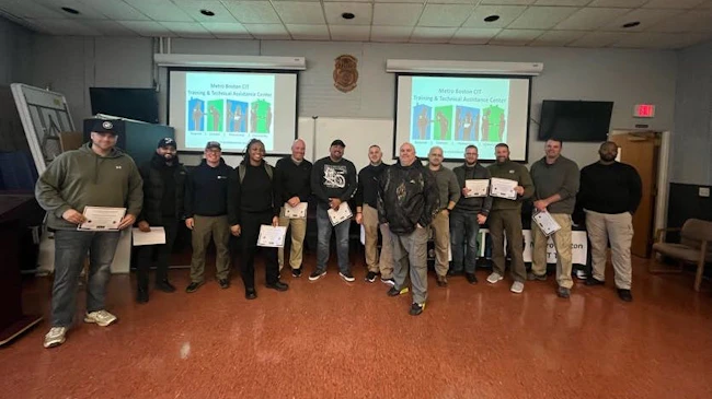 A group is seen after completing a two-day Advanced De-escalation & Documentation Training hosted by the Metro Boston CIT TTAC in November that included actors from Improv Asylum. .