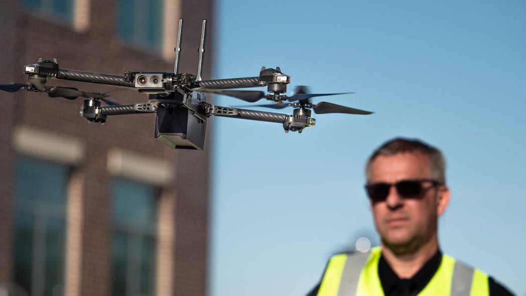 An officer is seen operating a Skydio X2 drone.