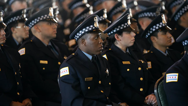 Chicago police officers attend a graduation and promotion ceremony at Navy Pier in August.