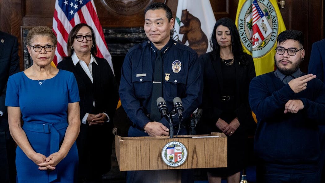 LAPD Assistant Chief Dominic H. Choi, with Mayor Karen Bass (left), is named new interim police chief at City Hall on Feb. 7.