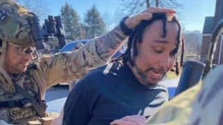 Law enforcement officers apprehend Kenneth DeHart in Knoxville, TN, on Monday. DeHart is accused of fatally shooting Blount County Sheriff's Deputy Greg McCowan and wounding another deputy during a traffic stop in Maryville last week.