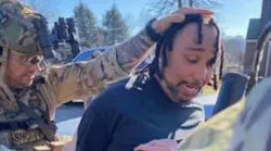 Law enforcement officers apprehend Kenneth DeHart in Knoxville, TN, on Monday. DeHart is accused of fatally shooting Blount County Sheriff's Deputy Greg McCowan and wounding another deputy during a traffic stop in Maryville last week.