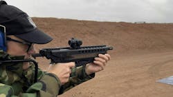 Lindsey shot the Kel-Tec R50 Defender, a 5.7 X 28 mm gun that has a 50 round capacity. Kel-Tec boasts that this gun is a tack driver, and we proved this on the range. It weighs 4.3 pounds unloaded, and folds down to 16.4'. Lindsey shot the Kel-Tec R50 Defender, a 5.7 X 28 mm gun that has a 50 round capacity. Kel-Tec boasts that this gun is a tack driver, and we proved this on the range. It weighs 4.3 pounds unloaded, and folds down to 16.4'.