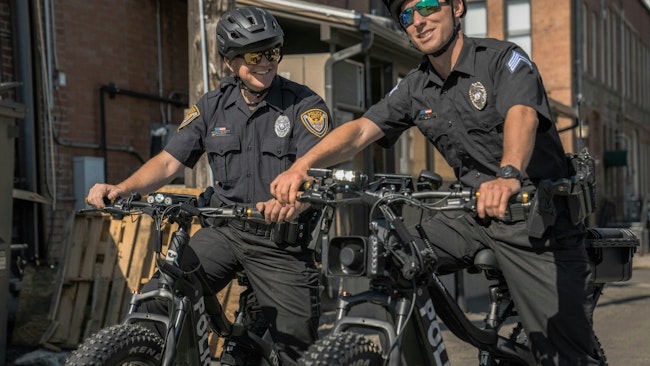 Officers are seen riding the QuietKat Patrol 10 E-Bike.
