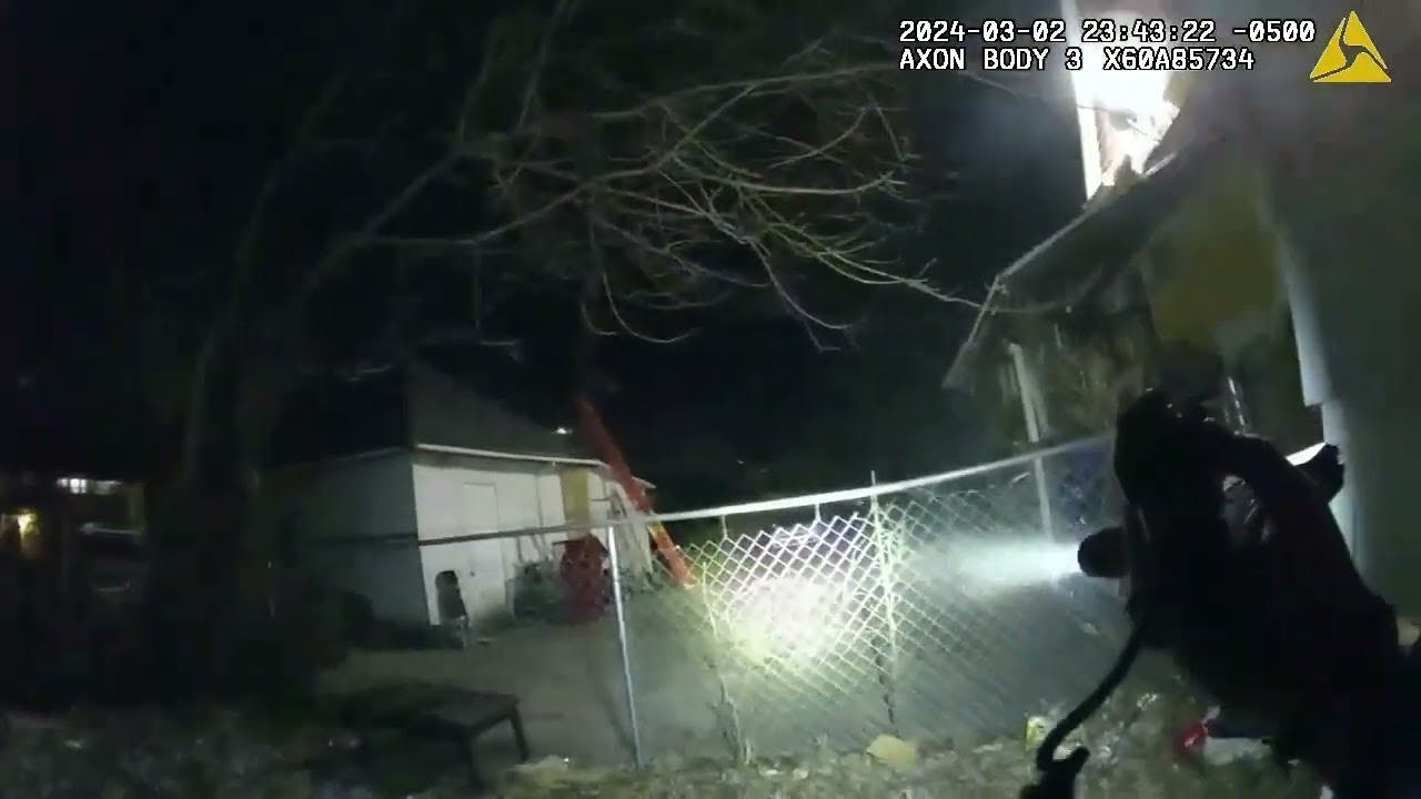 Police footage shows officers exchanging gunfire with man after traffic stop