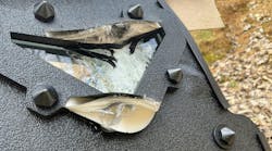 The viewport is seen after three .223 rounds were fired on it. Two hit the frame; one hit directly on glass. There was no penetration. The viewport is seen after three .223 rounds were fired on it. Two hit the frame; one hit directly on glass. There was no penetration.