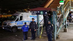 NYPD officers investigate a crime scene after six people were shot at the Mount Eden Avenue subway station in the Bronx on Feb. 12.