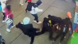A group of NYPD officers were trying to break up a disorderly crowd outside a Times Square migrant shelter Jan. 27, and when they attempted to put one of the men under arrest, multiple people attacked the officers.