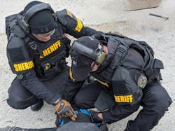 Green, Ohio, tactical medics practice an officer down drill, applying tourniquets and extricating a patient. Green, Ohio, tactical medics practice an officer down drill, applying tourniquets and extricating a patient.