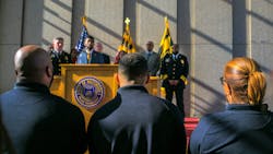 Attendees listen to Baltimore officials, including Police Commissioner Richard Worley (left) and Mayor Brandon Scott, during a news conference at Baltimore Police Department headquarters in January to discuss the progress of the federally mandated consent decree, implemented following the death of Freddie Gray from injuries sustained while in custody in 2015.