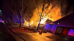 An off-duty Sonoma County, CA, sheriff&apos;s deputy and a Calistoga police officer kicked down a door to rescue a woman inside a home engulfed by flames early Saturday.