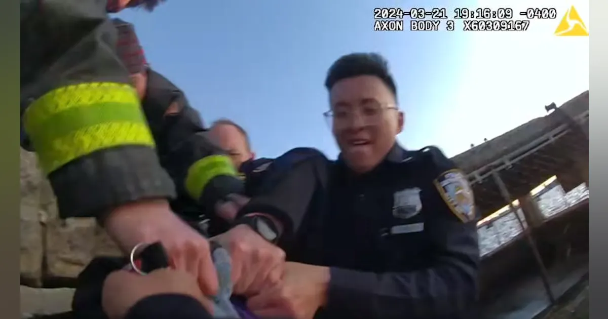 Police Officer Rescuing Watch NYPD Officer Plunge into River's Frigid Waters to Save Woman ...