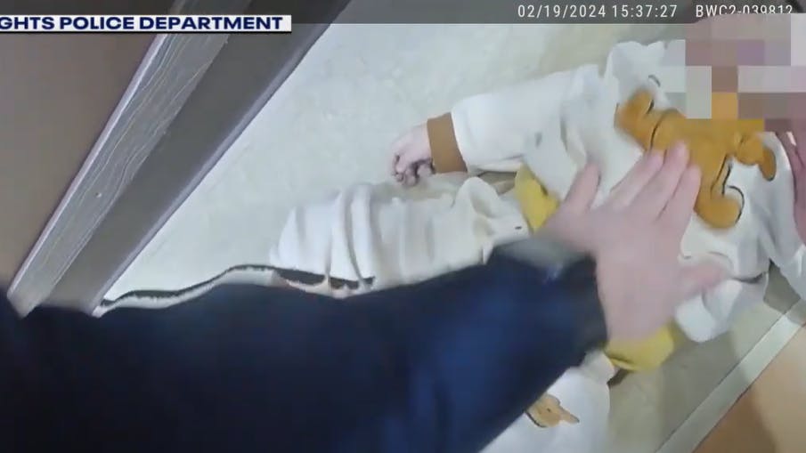 sterling_heights_police_officer_saves_baby_mi