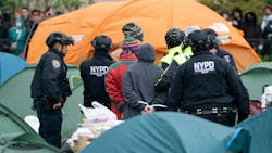 NYPD officers make arrests of Pro-Palestinian protestors on lawn of Columbia University Thursday April 18, 2024, in Manhattan, New York.