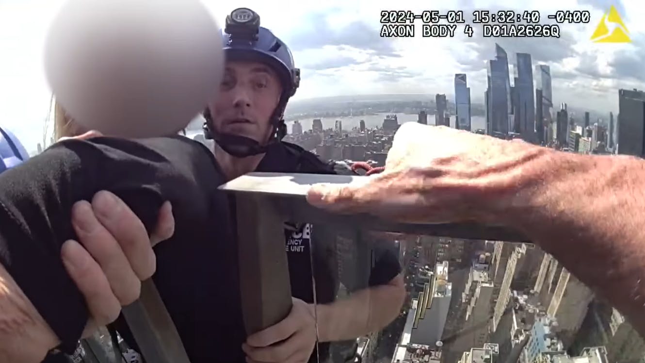 Detectives from the NYPD's Emergency Service Unit (ESU) used ropes May 1 to make a daring rescue of a woman who was on the rooftop ledge of a 54-story building.