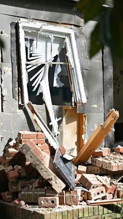 Debris is strewn out of the home where three members of the U.S. Marshals task force and Charlotte-Mecklenburg Police Officer Joshua Eyer were killed on April 29 when they were serving a warrant.