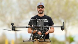 Arapahoe County, CO, Sheriff&apos;s Deputy Jamie Foster flies a drone during a training exercise at the Arapahoe County Fairgrounds in Aurora on May 14.