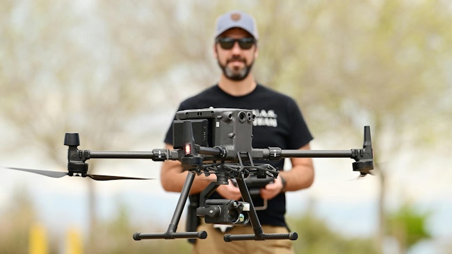 Arapahoe County, CO, Sheriff's Deputy Jamie Foster flies a drone during a training exercise at the Arapahoe County Fairgrounds in Aurora on May 14.