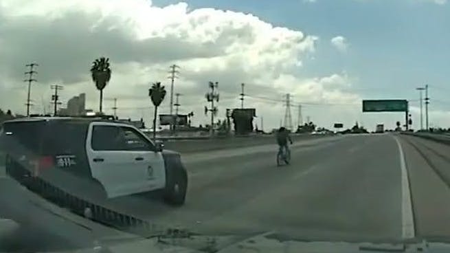 Dashcam video shows LAPD chasing attempted murder suspect riding bicycle on 5 Freeway