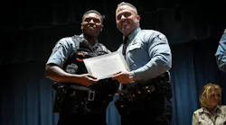 Minneapolis Police Officer Jamal Mitchell (left).