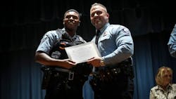 Minneapolis Police Officer Jamal Mitchell (left). Minneapolis Police Officer Jamal Mitchell (left).
