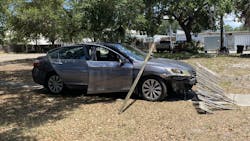 A St. Petersburg, FL, police officer stopped a wrong-way driver Monday by crashing into his vehicle, sending the car into a fence.