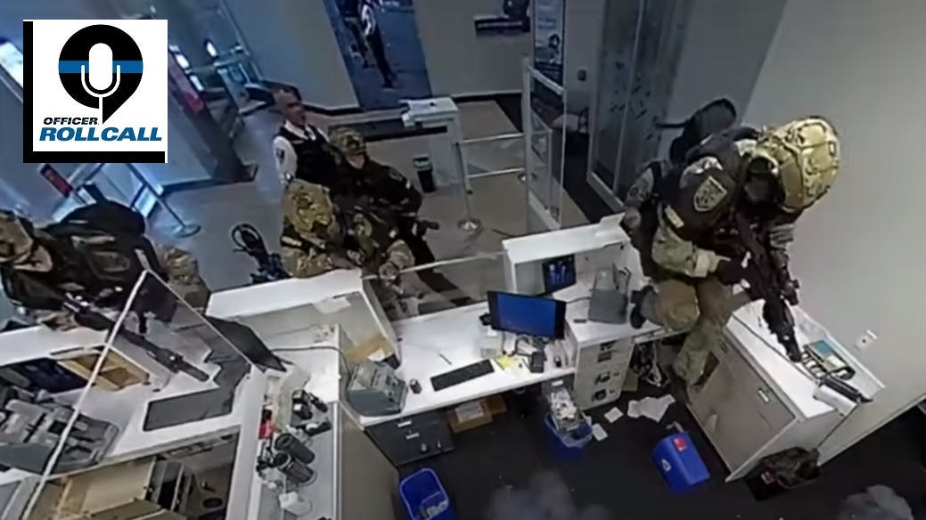 A sniper with the Lee County, FL, Sheriff's Office's SWAT unit fatally shot a knife-wielding suspect who was holding two people hostage in a Fort Myers bank.