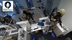 A sniper with the Lee County, FL, Sheriff's Office's SWAT unit fatally shot a knife-wielding suspect who was holding two people hostage in a Fort Myers bank.