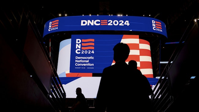Signage is displayed during a walkthrough of the Democratic National Convention in May at Chicago's United Center.