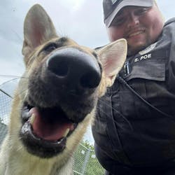 A German shepherd trapped in a hot car honked the vehicle&apos;s horn, leading to a rescue by an Indianapolis Metropolitan Police Department public safety officer, who ended up adopting the canine