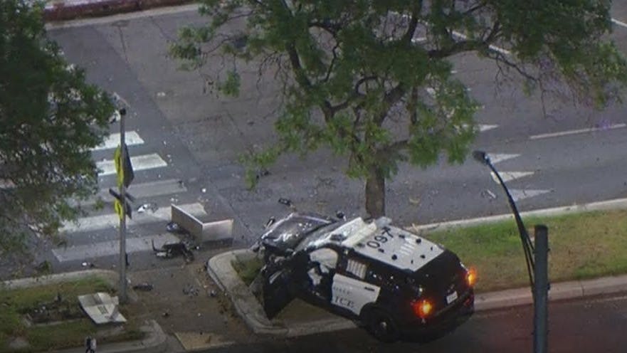 Robbery Suspect Carjacks Calif. Police Cruiser, Crashes Into Tree | Officer