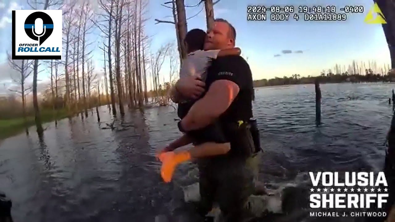 A Volusia County, FL, sheriff's deputy rescues a 5-year-old autistic boy who was clinging to a log in the middle of a pond.