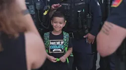 Dallas Police comes together to escort a fallen officer's son to his first day of school